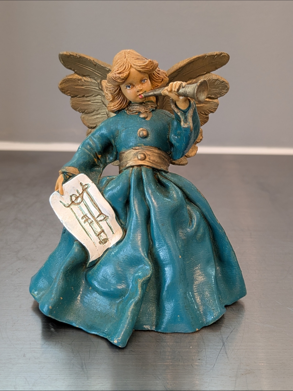 Teal Angel Figurine Playing Trumpet